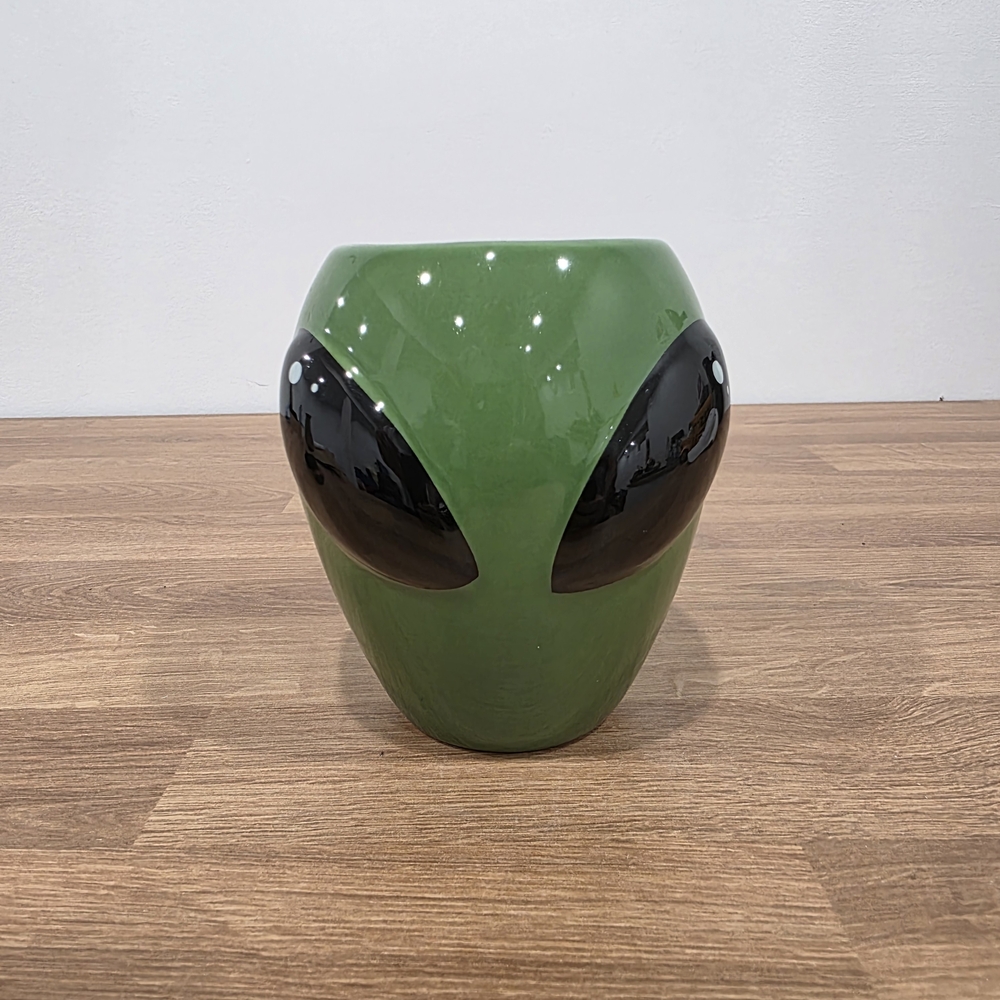 3D ceramic coffee mug shaped like an alien head